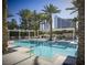 Stunning pool area featuring palm trees, lounge seating, and lush landscaping, providing a serene retreat at 2777 Paradise Rd # 2701, Las Vegas, NV 89109
