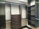 Organized walk-in closet with built-in shelving and drawers, maximizing storage space and convenience at 2777 Paradise Rd # 2701, Las Vegas, NV 89109