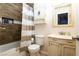 Bathroom with decorative shower curtain, and a classic vanity with sink at 2822 La Palma Dr, Laughlin, NV 89029