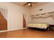 Minimalist bedroom featuring a platform bed, sheer curtains, and a clean, bright ambiance at 2822 La Palma Dr, Laughlin, NV 89029