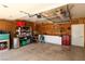 An organized two-car garage featuring storage shelves, work benches and ample space at 2822 La Palma Dr, Laughlin, NV 89029