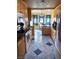 Bright and airy kitchen featuring granite countertops, light wood cabinets, and tile flooring at 2822 La Palma Dr, Laughlin, NV 89029