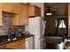 Open kitchen featuring granite countertops, stainless appliances and an easy view into the living room at 2822 La Palma Dr, Laughlin, NV 89029