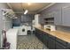 Spacious laundry room with cabinets, countertops, appliances, and neutral gray tones at 2822 La Palma Dr, Laughlin, NV 89029