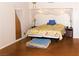 Comfortable bedroom featuring a decorative canopy bed, side tables, and natural light at 2822 La Palma Dr, Laughlin, NV 89029