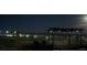 Outdoor patio with a view of the city lights at night at 2822 La Palma Dr, Laughlin, NV 89029