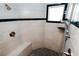 Shower featuring stone floors, tiled walls and multiple shower heads at 2822 La Palma Dr, Laughlin, NV 89029