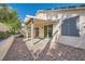 This backyard features a covered patio, landscape, and rocks at 285 Canyon Spirit Dr, Henderson, NV 89012