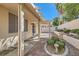 Backyard patio area with manicured landscaping and gravel ground cover at 285 Canyon Spirit Dr, Henderson, NV 89012