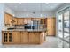 Well-equipped kitchen with modern appliances, ample cabinet space, and a view to the backyard at 285 Canyon Spirit Dr, Henderson, NV 89012