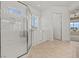 Beautiful bathroom featuring a glass walk-in shower and separate bathtub at 2868 Foxtail Creek Ave, Henderson, NV 89052