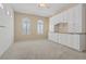 Spacious bedroom with built-in storage cabinets and drawers, complemented by two arched windows at 2868 Foxtail Creek Ave, Henderson, NV 89052
