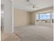 Bright main bedroom featuring large bay windows with views, and ensuite bathroom at 2868 Foxtail Creek Ave, Henderson, NV 89052