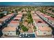 Expansive aerial view of a well-maintained community with desert landscaping and mountain views at 3120 Inlet Bay Ave, North Las Vegas, NV 89031