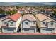 Aerial view of a residential neighborhood with houses and streets at 3120 Inlet Bay Ave, North Las Vegas, NV 89031