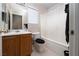 Bathroom with a white shower curtain and toilet at 3120 Inlet Bay Ave, North Las Vegas, NV 89031