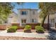 Exterior of a two-story home with a small front yard at 3120 Inlet Bay Ave, North Las Vegas, NV 89031