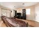 Comfortable living room with tile flooring and a large media center for entertainment at 3120 Inlet Bay Ave, North Las Vegas, NV 89031