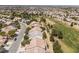 A high, aerial view of the neighborhood, near the golf course at 3312 Lapwing Dr, North Las Vegas, NV 89084