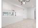 Bright living area with a ceiling fan and large windows offering plenty of natural light at 3312 Lapwing Dr, North Las Vegas, NV 89084