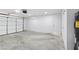 Spacious garage with an automatic door, offering ample room for parking and storage at 3326 Mount Charleston Dr, Pahrump, NV 89048