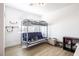 Bedroom features a bunk bed with a futon, perfect for a room or guest space at 3440 Ernest St, North Las Vegas, NV 89032
