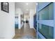 Bright entryway featuring modern wood flooring, neutral walls, and stylish decor at 3440 Ernest St, North Las Vegas, NV 89032