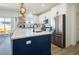 Modern kitchen featuring a large island, stainless steel appliances, and sleek cabinetry at 3440 Ernest St, North Las Vegas, NV 89032