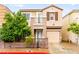 Charming two-story home with neutral exterior, balcony, and attached garage at 3619 Hat Rock Ct, Las Vegas, NV 89129