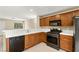 Cozy kitchen area equipped with modern appliances and plenty of counter space for food preparation at 3619 Hat Rock Ct, Las Vegas, NV 89129