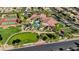 Aerial view of community center with tennis courts, putting green, pool and beautifully landscaped grounds at 3712 Rocklin Peak Ave, North Las Vegas, NV 89081