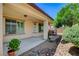 Beautiful covered back patio with outdoor seating, offering a seamless blend of indoor-outdoor living at 3712 Rocklin Peak Ave, North Las Vegas, NV 89081