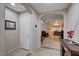 Bright entryway leading into a spacious home, featuring tile floors and neutral decor at 3712 Rocklin Peak Ave, North Las Vegas, NV 89081