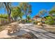 Beautiful park area with walking path, gazebo and lush landscaping creates a serene outdoor space at 3712 Rocklin Peak Ave, North Las Vegas, NV 89081