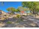 Beautiful park area with a decorative rock garden and walking path creates a serene outdoor space at 3712 Rocklin Peak Ave, North Las Vegas, NV 89081