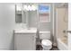 A traditional bathroom with a single sink vanity, toilet, and shower-tub combo at 4321 Stockbridge St, Las Vegas, NV 89115