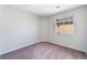 Bedroom with neutral carpet and a window at 4321 Stockbridge St, Las Vegas, NV 89115