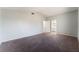 Spacious main bedroom with neutral carpet and access to ensuite bathroom at 4321 Stockbridge St, Las Vegas, NV 89115