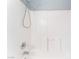 Bright shower-tub combination featuring white tiled walls and updated shower head at 4321 Stockbridge St, Las Vegas, NV 89115