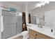 Clean bathroom featuring a single sink vanity, shower, and tile flooring at 439 Pelican Bay Ct, Henderson, NV 89012