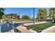 Outdoor bocce ball court with benches and shade, perfect for leisurely afternoons with friends and Gathering at 439 Pelican Bay Ct, Henderson, NV 89012