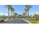 Community center entrance lined with palm trees, offering a welcoming gateway to community amenities at 439 Pelican Bay Ct, Henderson, NV 89012