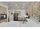 Bright kitchen featuring sleek countertops, stainless steel appliances, and light wood cabinetry at 439 Pelican Bay Ct, Henderson, NV 89012