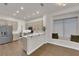 Spacious kitchen with stainless steel appliances, white countertops, and a cozy breakfast nook at 439 Pelican Bay Ct, Henderson, NV 89012