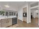 Spacious open-concept kitchen with a breakfast bar, stainless appliances, and ample countertop space at 439 Pelican Bay Ct, Henderson, NV 89012