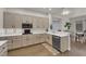 Well-lit kitchen with wood cabinets, gas range, and stainless steel appliances with ample counter space at 439 Pelican Bay Ct, Henderson, NV 89012