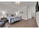 Spacious main bedroom with hardwood floors, ensuite bathroom, and a walk-in closet at 439 Pelican Bay Ct, Henderson, NV 89012