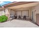 Cozy covered patio with ceiling fan, perfect for outdoor dining and relaxation at 439 Pelican Bay Ct, Henderson, NV 89012