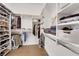 Well-organized walk-in closet with shelves, rods, and ample storage space at 439 Pelican Bay Ct, Henderson, NV 89012