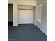 Bedroom view with carpet, window with blinds and neutral wall color at 5024 Saint Annes Dr, Las Vegas, NV 89149